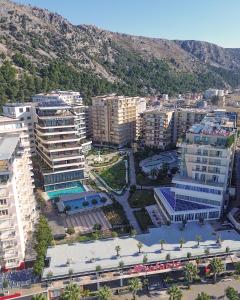 an aerial view of a city with tall buildings at Rafaelo Deluxe Hotel & Spa Shengjin in Shëngjin