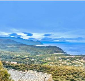 a view of the ocean from a house at Villa Emmanuella in Centuri +7 photos