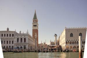 a view of a city with a clock tower at Gabrielli Luxury Apartments Venezia - Starhotels Collezione in Venice