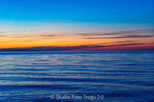 a sunset over a large body of water at Di Giuseppe Laura in Ladispoli