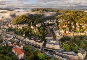 an aerial view of a city with buildings at Lázeňský Hotel Sadový Pramen in Karlovy Vary