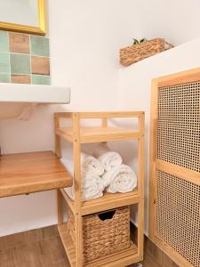 a room with a towel rack and some towels at MooN by Sun&Moon Cabins in Măneciu +59 photos