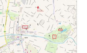 a map of a city with red squares at Katerina Apartman in Gyula