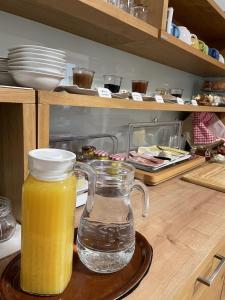 a jug of orange juice sitting on a counter at Gästehaus Watschinger in Bad Wimsbach-Neydharting