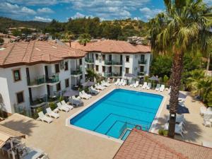 an aerial view of a villa with a swimming pool at Fethiye Park Hotel in Fethiye