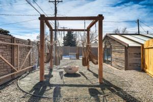 a playground with a hammock and a swing set at Urban Float in Colorado Springs +27 photos