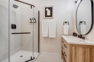 a bathroom with a shower and a sink at Urban Float in Colorado Springs
