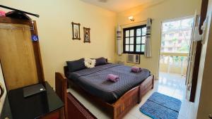 Gallery image of 2bhk flat with pool in candolim in Aguada +29 photos