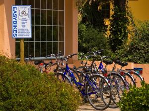 a group of bikes parked in front of a building at Apartment in Empuriabrava by the Beach in Empuriabrava