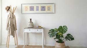 a white table with a plant in a room at Allegra Toscana - Affittacamere Guest house Arezzo in Arezzo +222 photos