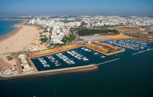an aerial view of a harbor with boats in the water at Estudio Boho Mar in Praia da Rocha +5 photos