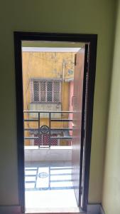 a view of a balcony from an open door at Apartment in Khardaha in Khardah
