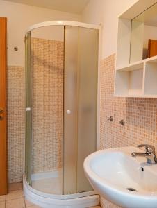 a bathroom with a shower and a sink at Mountain Suite in Raveo +47 photos