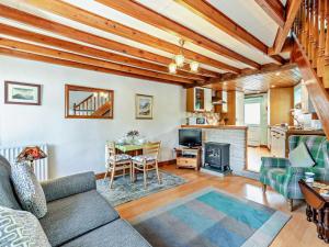 a living room with a couch and a table at 2 Bed in Keswick oc-sz145 in Braithwaite