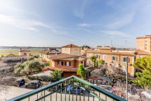 a view of a city from a balcony at Casa flowers in Ciampino