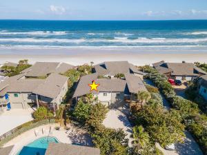 an aerial view of a house on the beach at Sea Dunes Nautilus B8 in New Smyrna Beach
