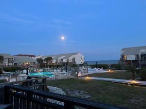 a view of a swimming pool at night at Beautiful view from a peaceful place in St. George Island