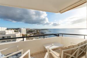 a balcony with a view of the ocean at Club Villamar Exclusive Beachfront Penthouse in Adeje +29 photos