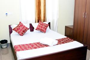 Postel nebo postele na pokoji v ubytování Holidayincoorg Cozy Nest