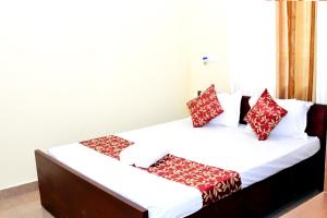 Postel nebo postele na pokoji v ubytování Holidayincoorg Cozy Nest