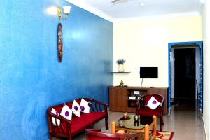 TV a/nebo společenská místnost v ubytování Holidayincoorg Cozy Nest