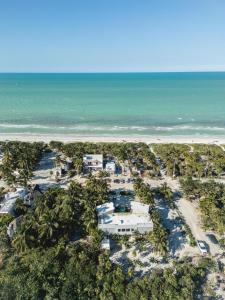 an aerial view of a resort and the ocean at Cucu Hotel El Cuyo in El Cuyo