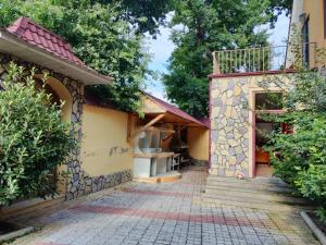 a house with a balcony and a walkway at Villa Nabran in Nabran