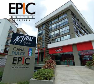 a building with a sign in front of it at Epic Suite 511 Premium Airport in Pereira