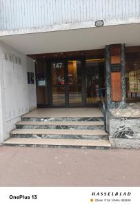 an entrance to a building with stairs in front at Ocean Bleu Toulouse in Toulouse