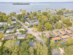 an aerial view of a park next to the water at Bad Hoophuizen Chalet L-Cube 6 Nr Eik 19 in Hulshorst