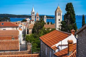 a view of the city of dubrovnik from above at Apartments in Lopar - Insel Rab 17729 in Lopar +14 photos