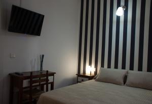 Cama o camas de una habitación en Hostal- Restaurante Estación Vía Verde