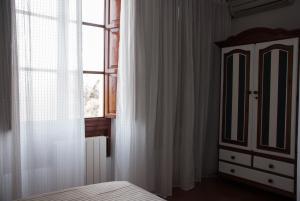 Cama o camas de una habitación en Hostal- Restaurante Estación Vía Verde