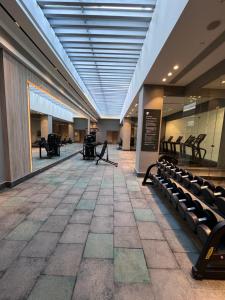 an empty lobby with chairs in a building at Jw Marriott residence in Cairo