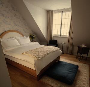 Postel nebo postele na pokoji v ubytování Auberge Willow Inn