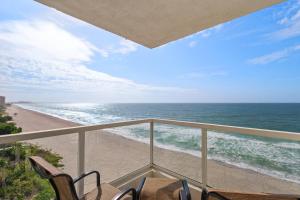 a view of the beach from a balcony at Privateer #601 in Longboat Key +38 photos