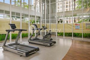 a gym with two exercise bikes in a building at Elion by Kozystay - BSD in Samporo