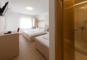Posteľ alebo postele v izbe v ubytovaní Villa Klara Guest House + 15 fotografií