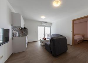 TV a/nebo společenská místnost v ubytování Apartments Villa Klara
