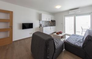 TV a/nebo společenská místnost v ubytování Apartments Villa Klara