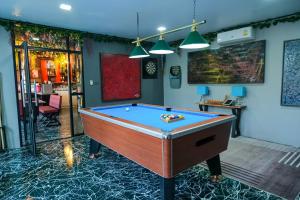 a billiard room with a pool table in it at The Longhouse Luxury Boutique Resort in Sakon Nakhon