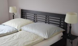 Ліжко або ліжка в номері Apartment mit großem Balkon
