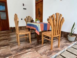 a dining room with a table and chairs at Lio Villa in Habaraduwa Central