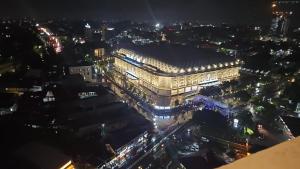 a night view of a building in a city at Alton by Be rent in Jatingaleh +1 photo