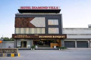 a building with a sign that reads hotel diamond village at Hotel Diamond Villa and Banquet in Amritsar