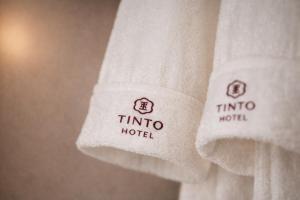 a close up of two towels in a hotel room at Tinto Hotel Busan Station in Busan