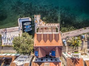 an overhead view of a building with an orange roof at Eco Hotel Carrubba in Tivat