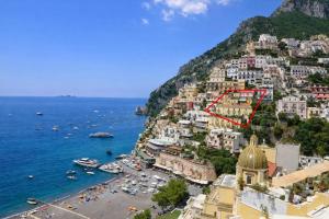 a view of the amalfi coast with a red map at Hotiday Positano Sea View in Positano