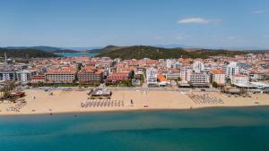 an aerial view of a beach and a city at Buyuk Berk Hotel in Ayvalık