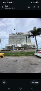 a view of a large building with a parking lot at D Elite in Kota Bharu